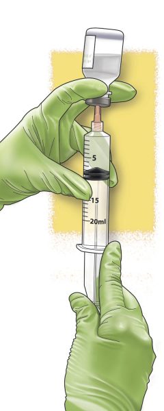 gloved hands drawing fluid from vial with syringe